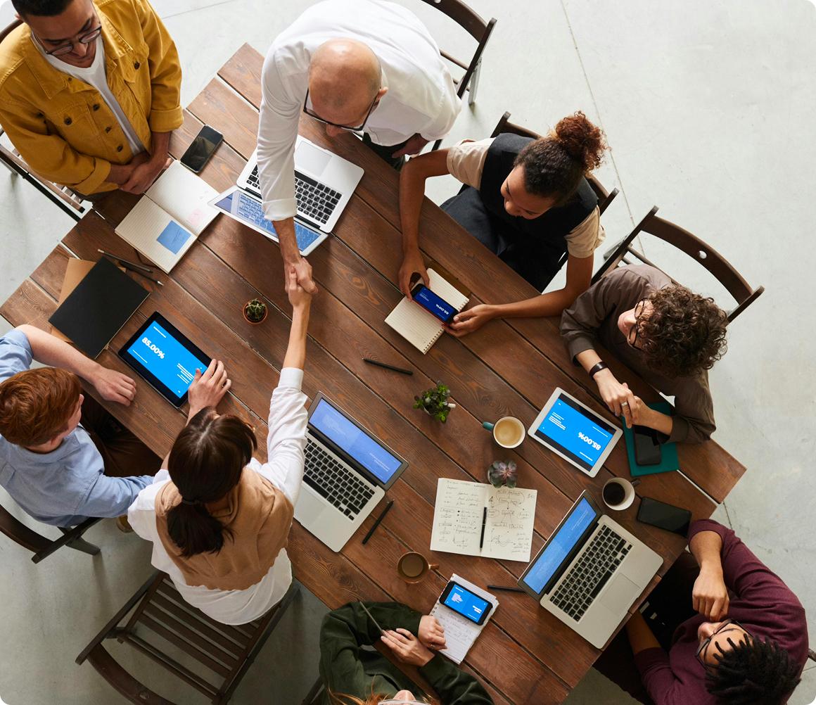 Business leaders collaborating around a table